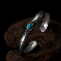 Coin-Inlaid Turquoise Bracelet
