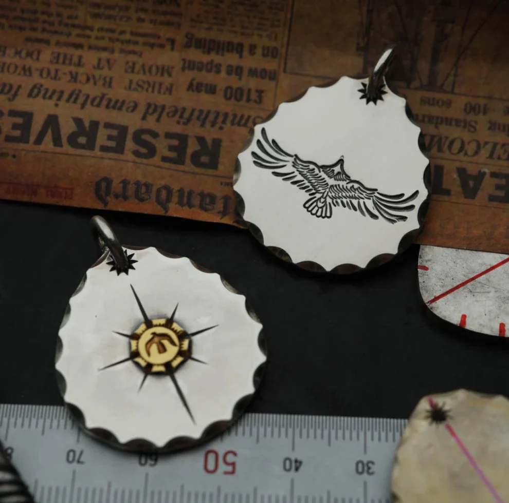 Serrated-Edge Silver Disc Necklace with Gold-Accented Sun Motif